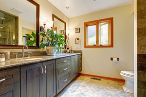 Bathroom with black double-sink vanity with mirrors