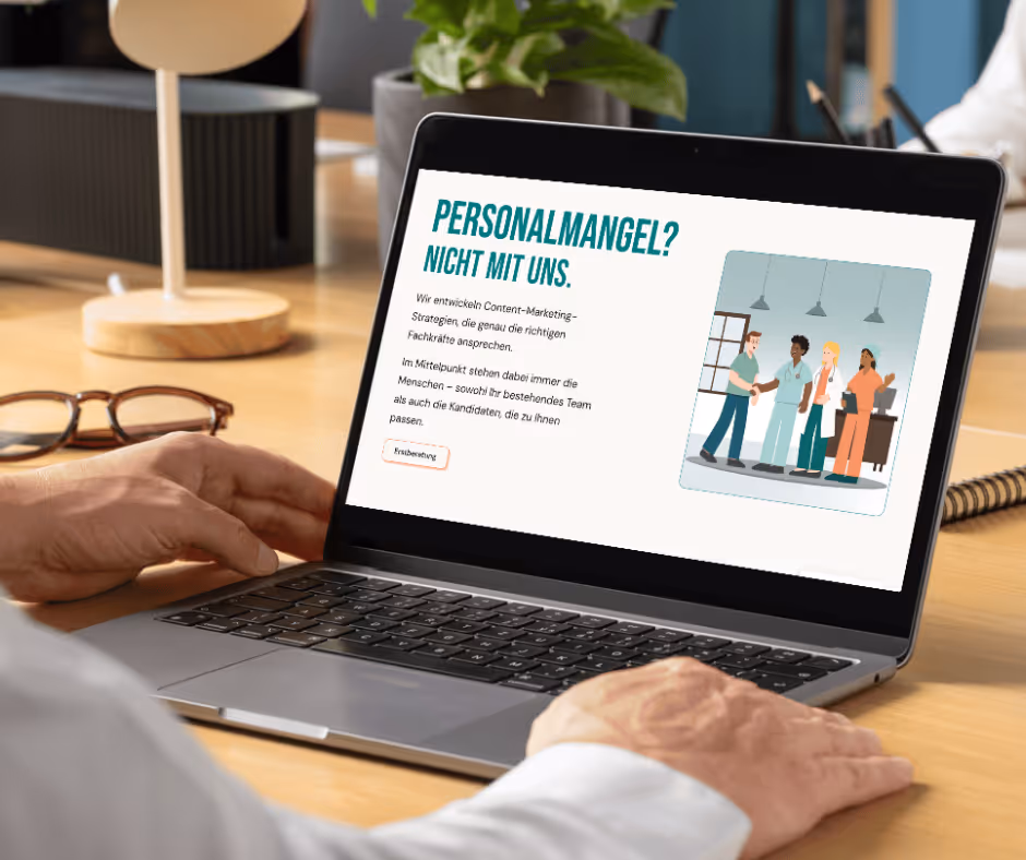 Person viewing a laptop displaying a webpage about addressing personnel shortages with a graphic of diverse professionals shaking hands.