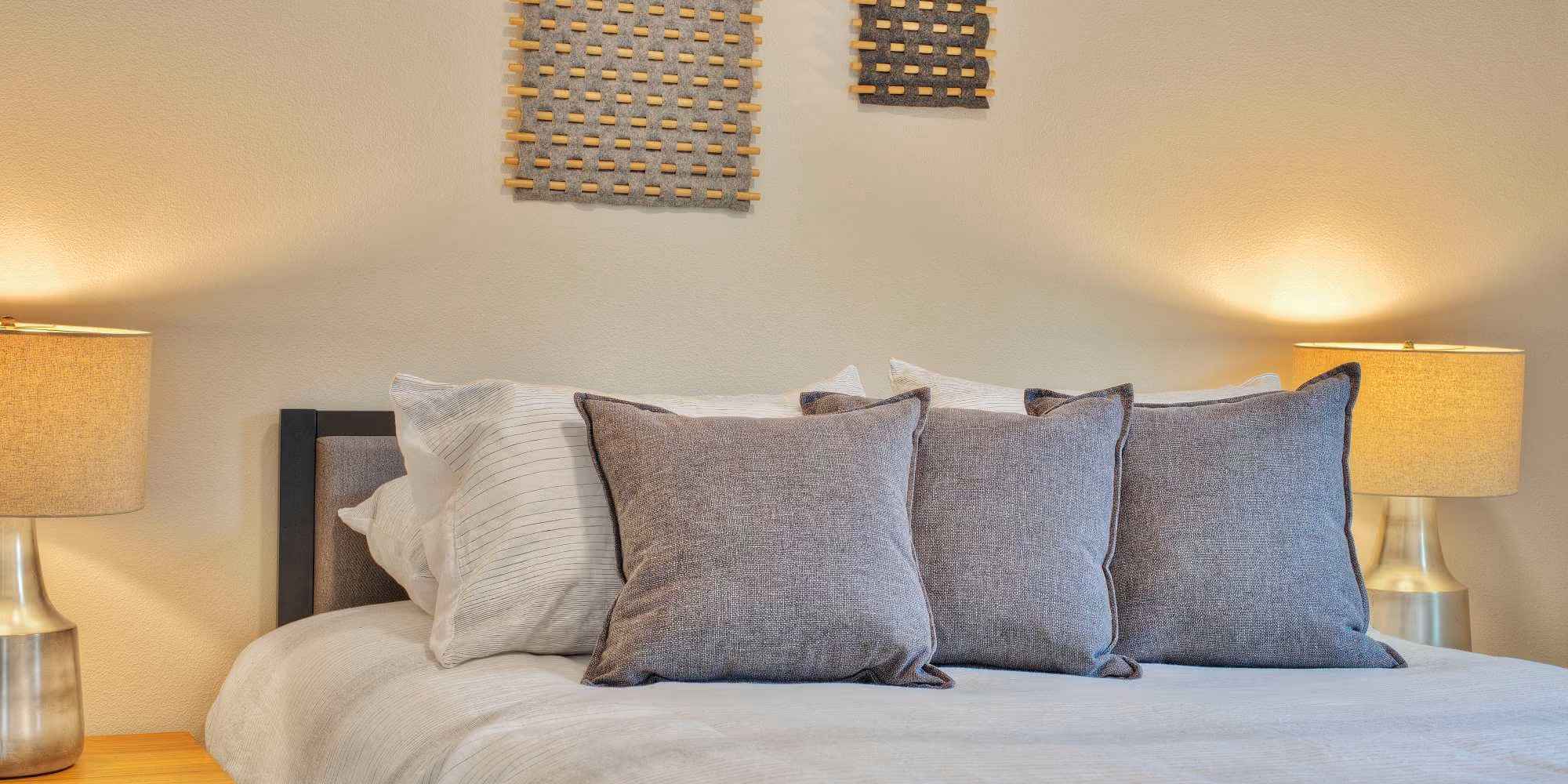Bed with pillows and furniture