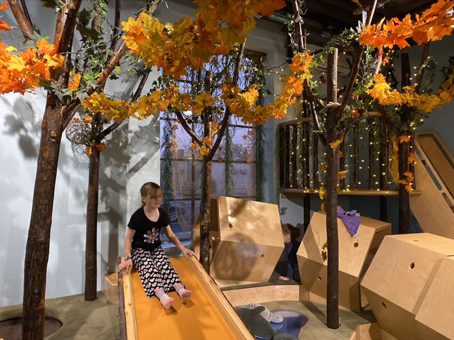 Children exploring hands-on exhibits at SPI Spot, an interactive science and play space in downtown Mount Vernon