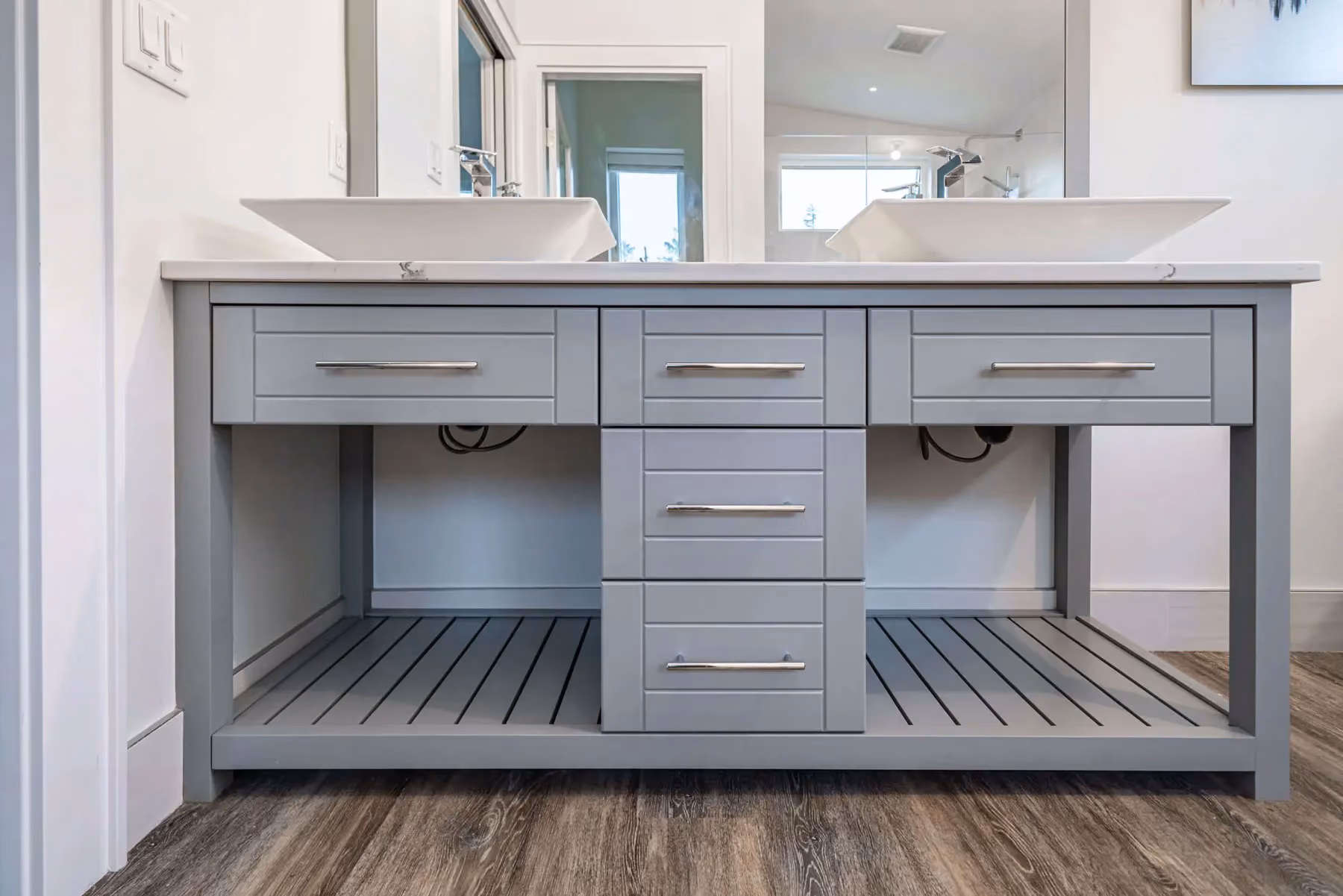 Clean bathroom sinks in a Comox Valley home.