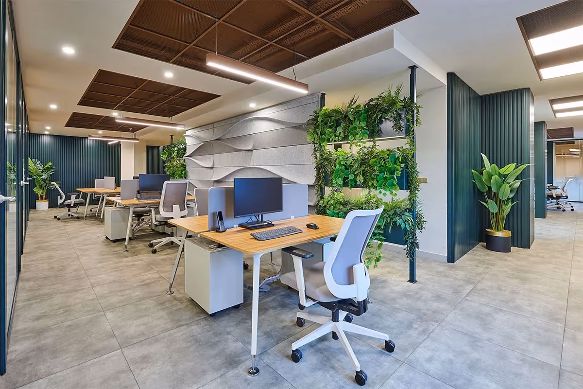 An example of a clean, modern office space with desks and computers.