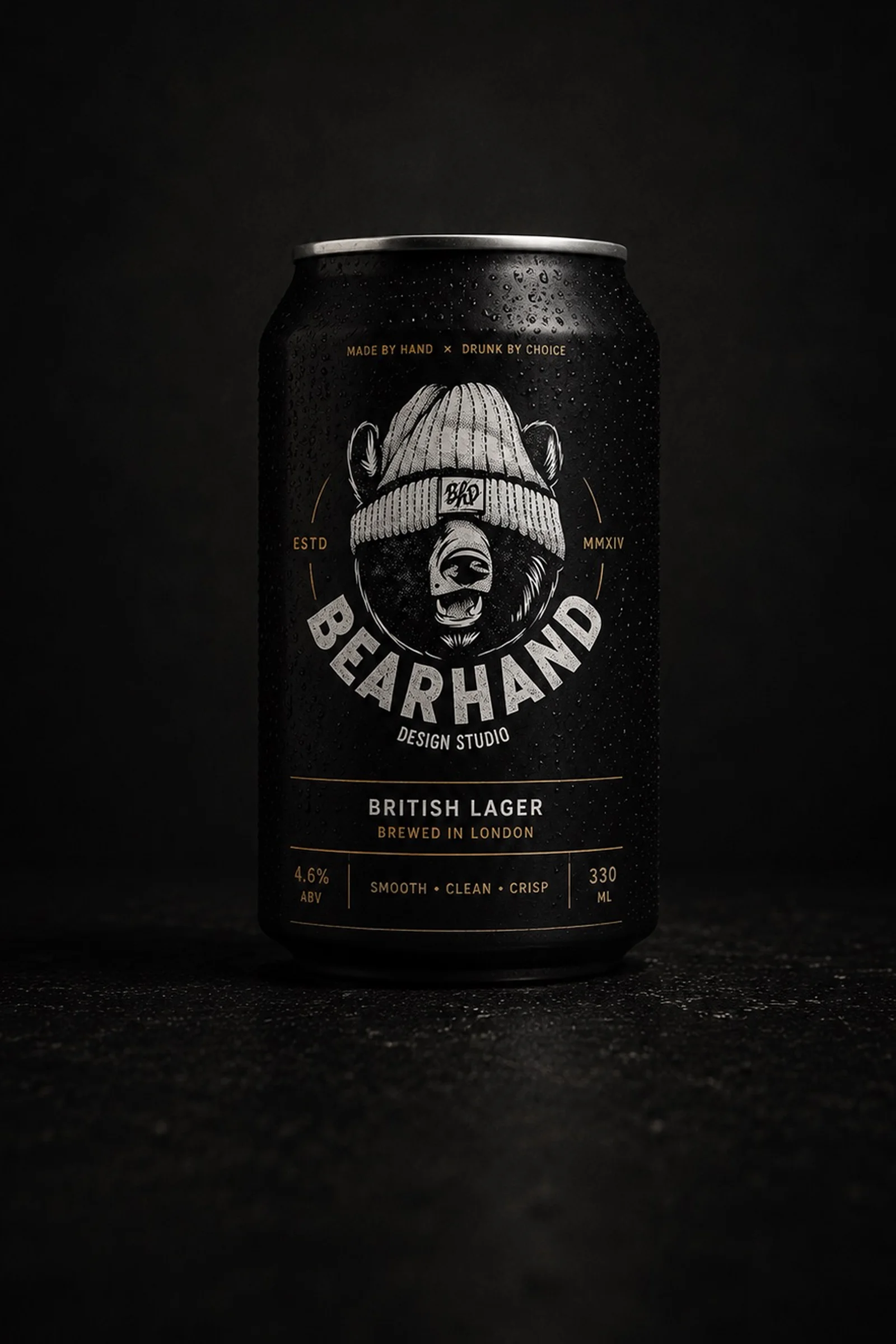 Black BEARHAND British lager can featuring an illustrated bear character on the label.