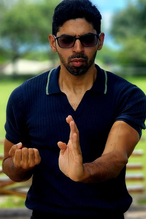 a student practicing his siu lim tao form, the first form in the wing chun system( also known as ving tsun kung fu ) in fort lauderdale florida
