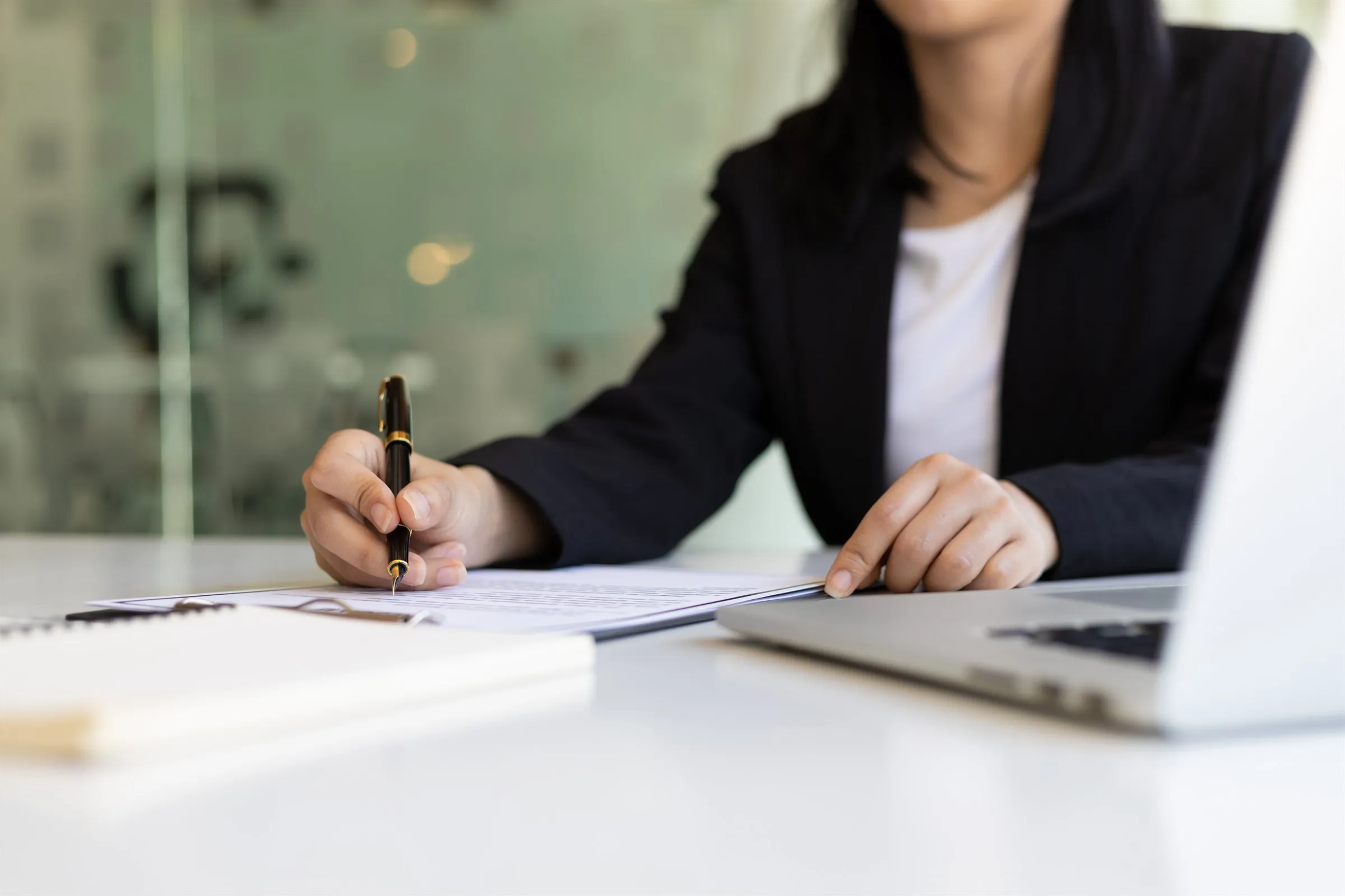 Attorney reviewing documents at a desk