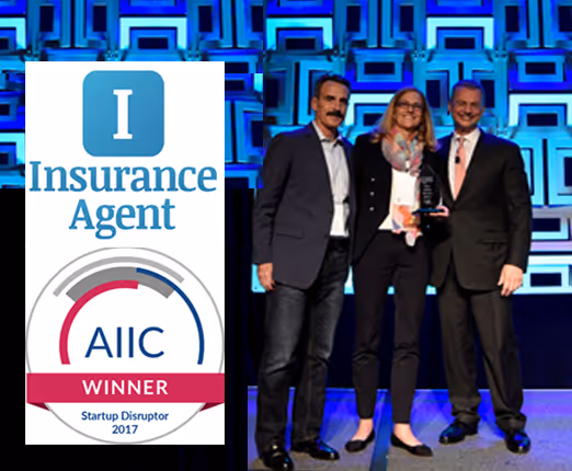 Insurance Agent App co-founders accepting a glass trophy on stage, shown beside the ACORD Insurance Innovation Challenge Startup Disruptor 2017 winner badge