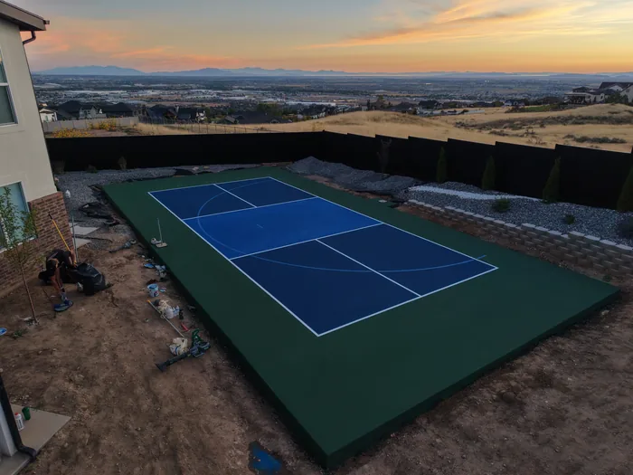 Pleasant View backyard sport court overlooking the valley at sunset