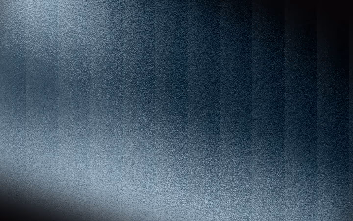Gradient abstract background with vertical blurred lines in dark blue and black tones.