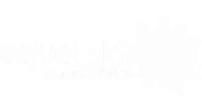 Velvet Skin beauty treatment and skincare logo featuring a stylized flower.
