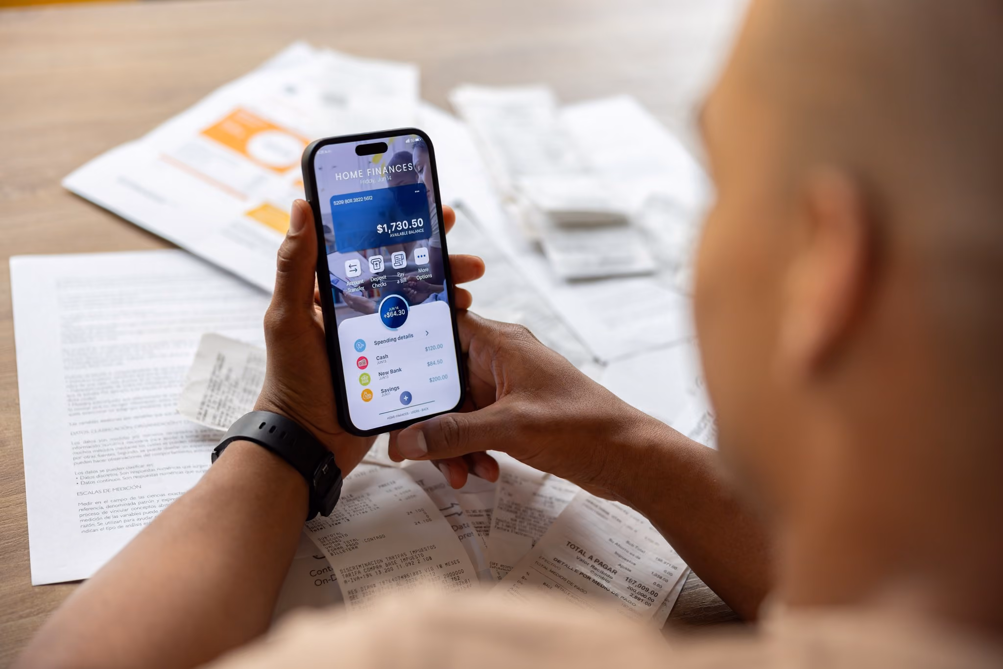 Man checking his bank account on his phone