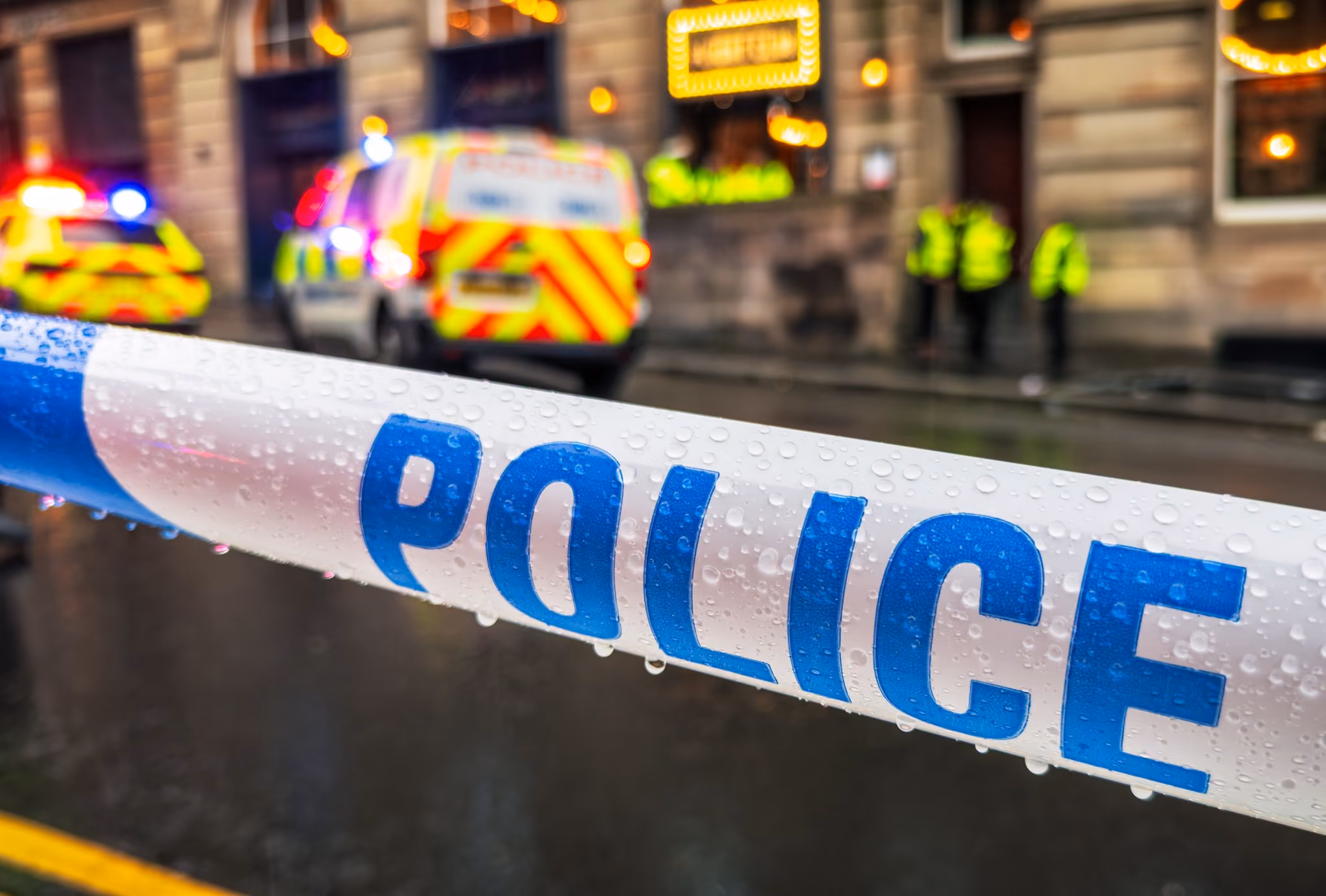 Police cordon tape at the scene of an incident