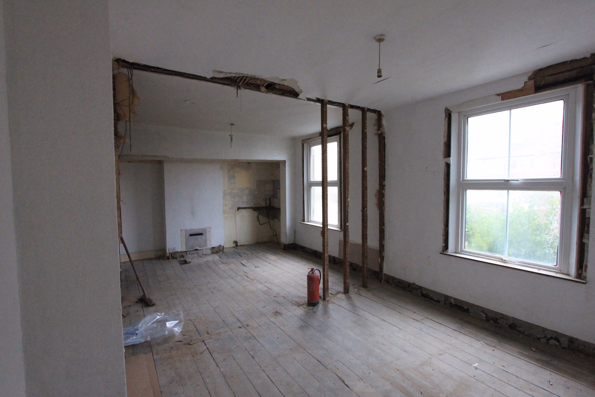 Empty room in a building midway through construction