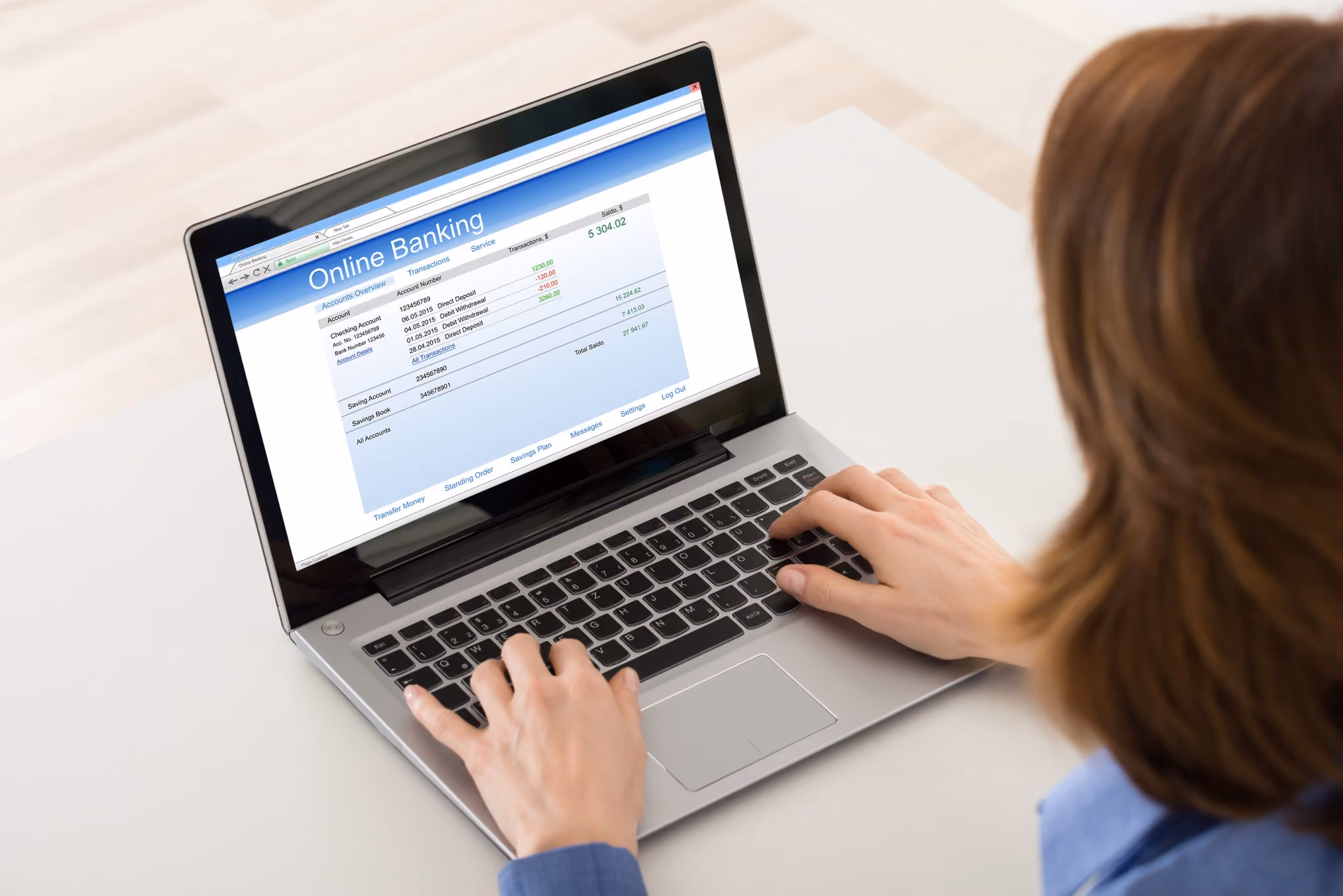 Woman making a payment on an online banking screen