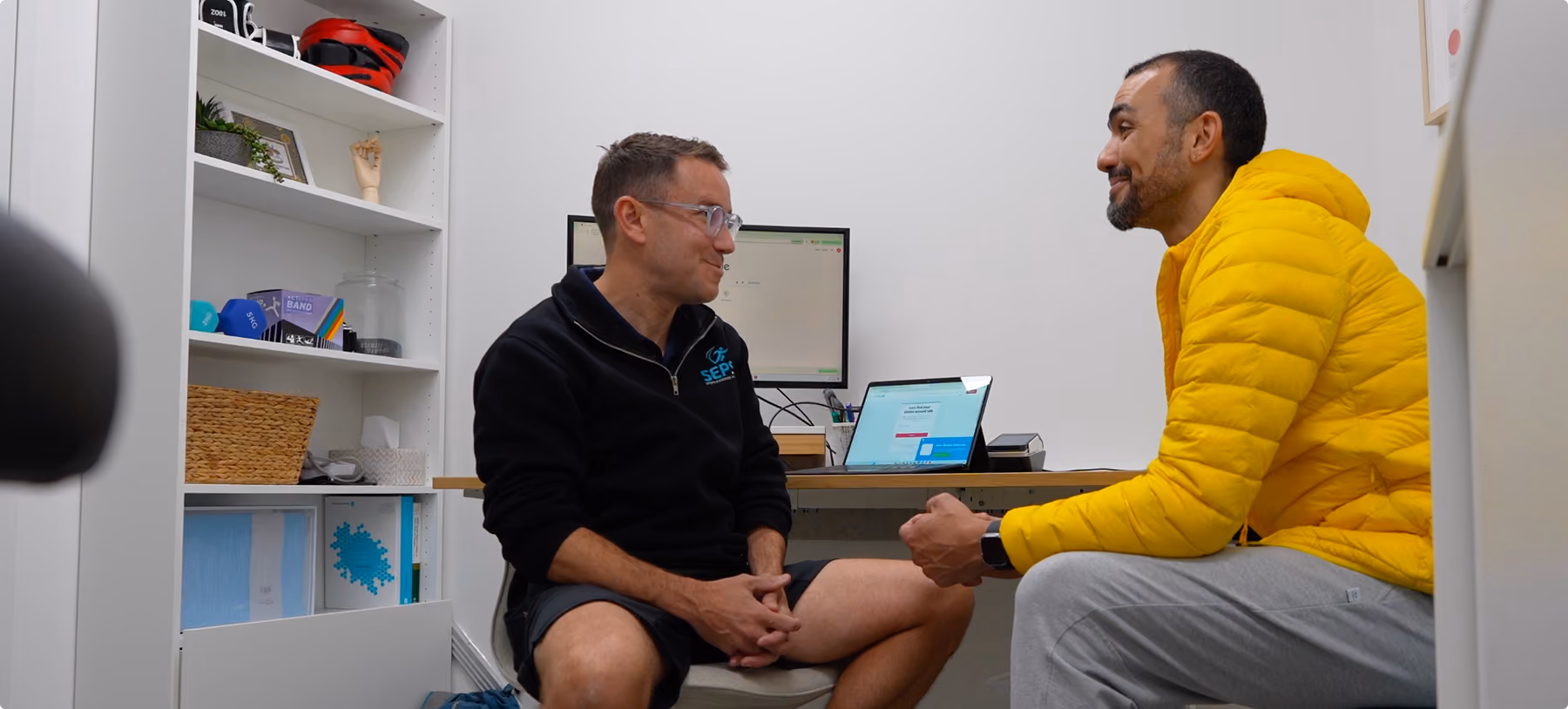 chris chatting to a client