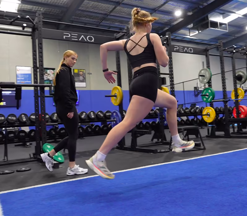 athlete running in gym