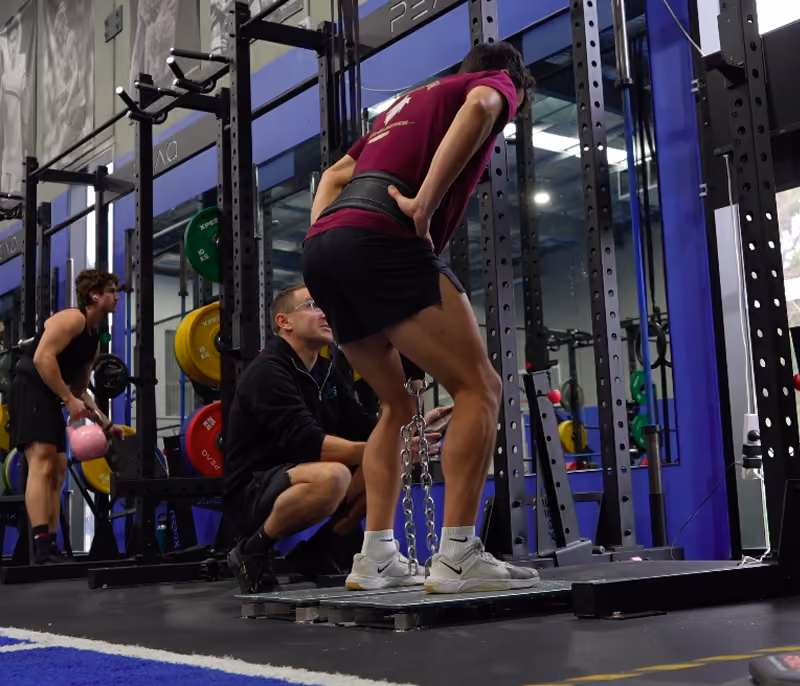 chris training staff member in gym at sepsa flinders