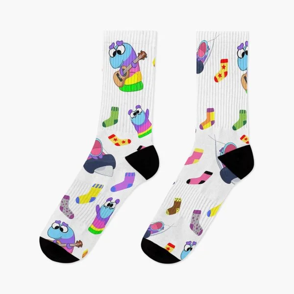 White and black socks with sock monsters on them
