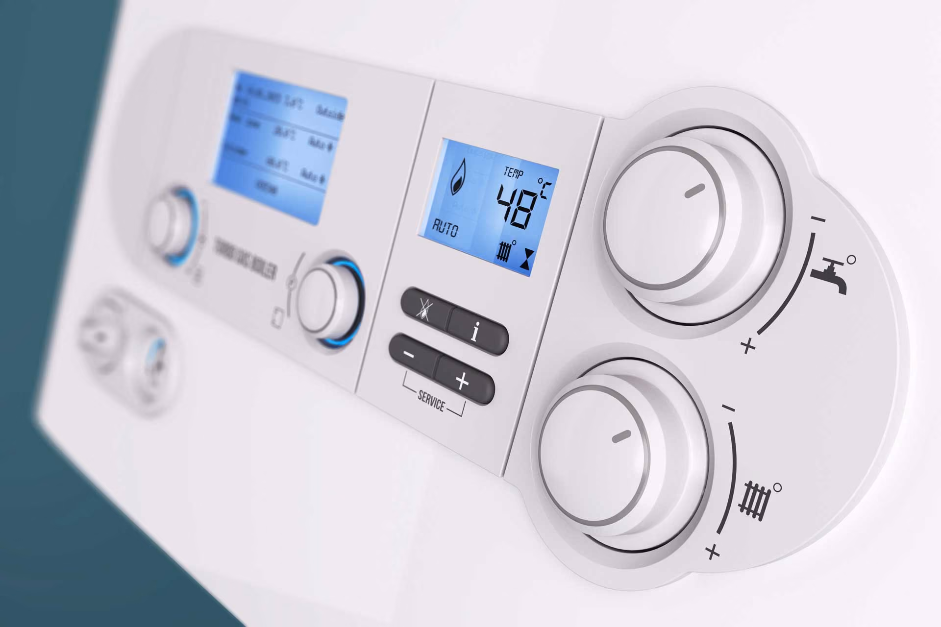 Close-up of a control panel with two digital displays and two round dials.