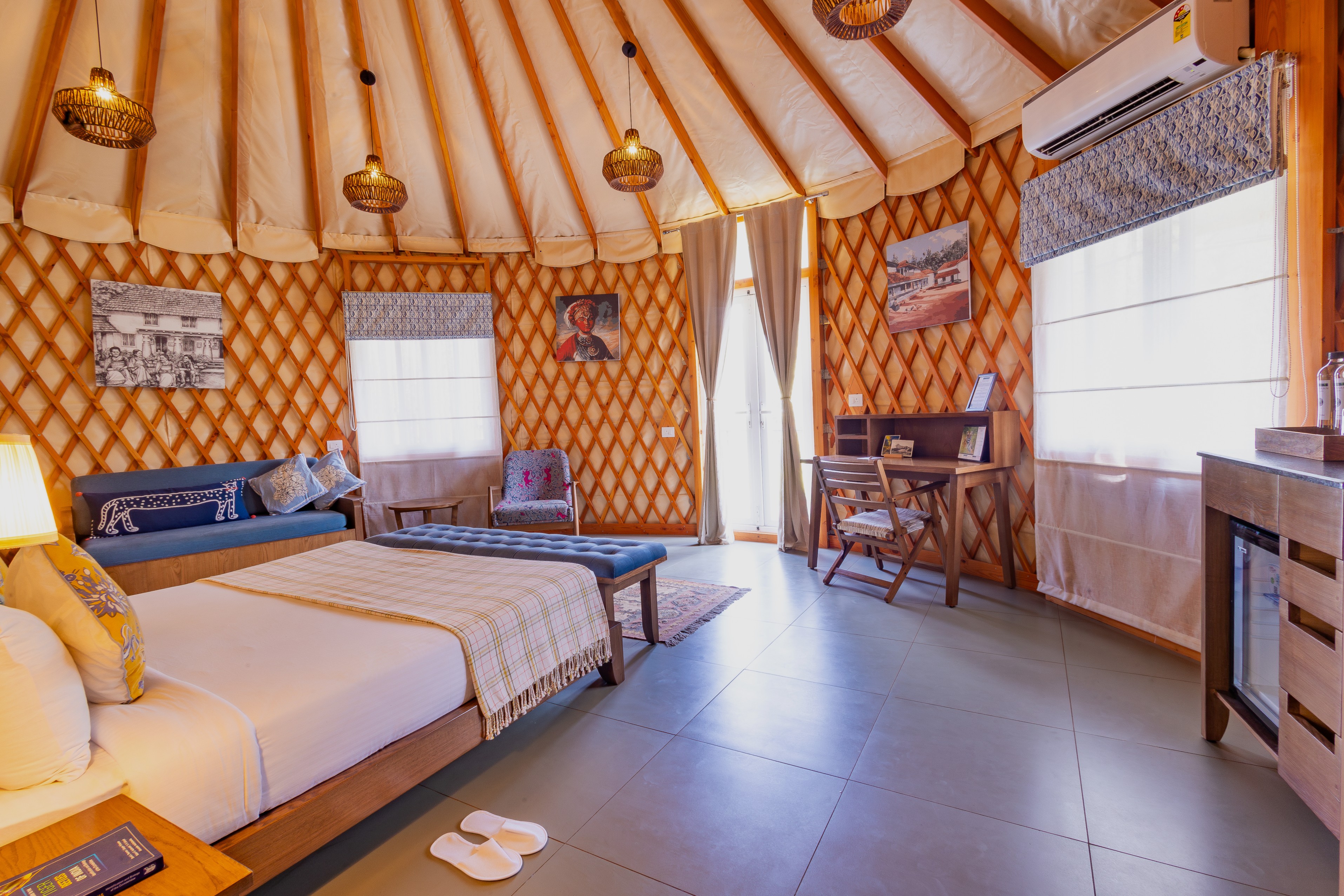 Yurt interior at Machaan with premium furnishings