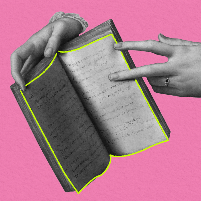 Hands paging through an old open book, on a pink square