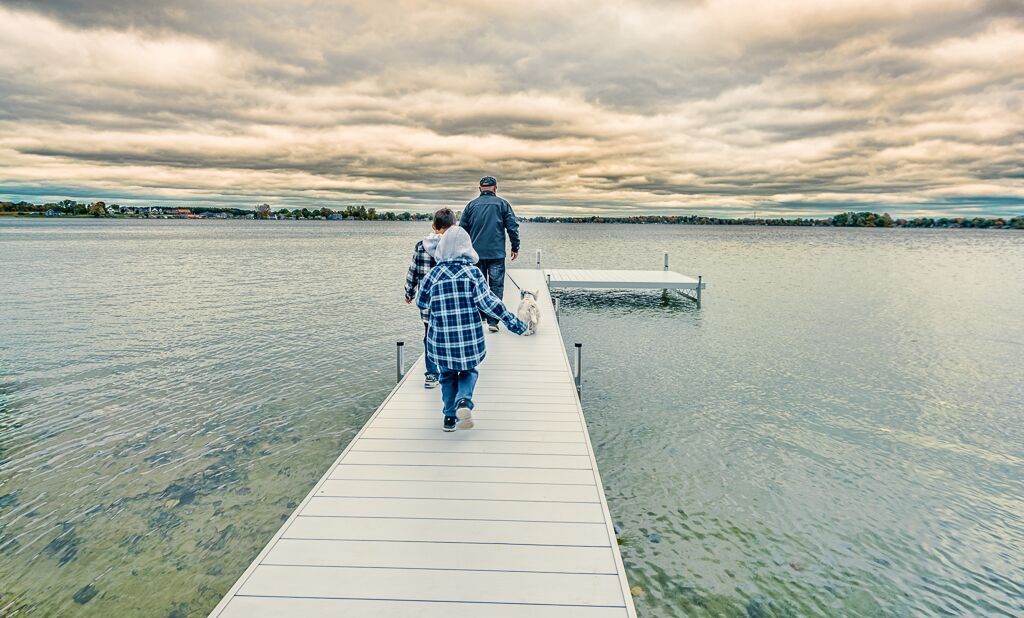 This image has an empty alt attribute; its file name is Walking-Down-Dock.jpeg