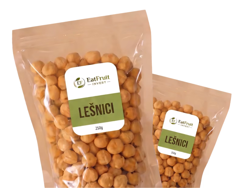 Two transparent packages of hazelnuts labeled 'Lešnici' from EatFruit Invest, each weighing 250g.
