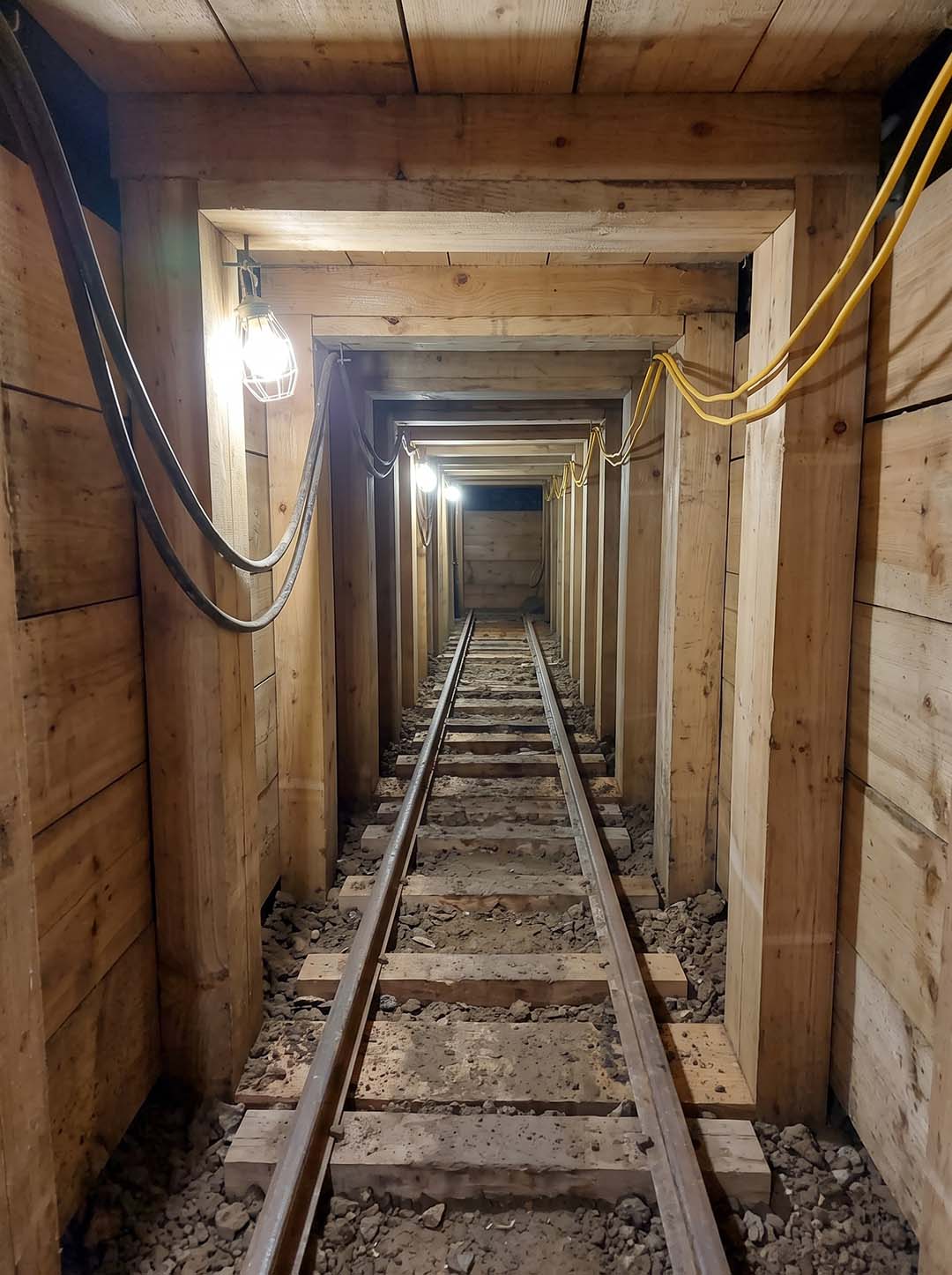 Blue mains in a deep segment-lined shaft