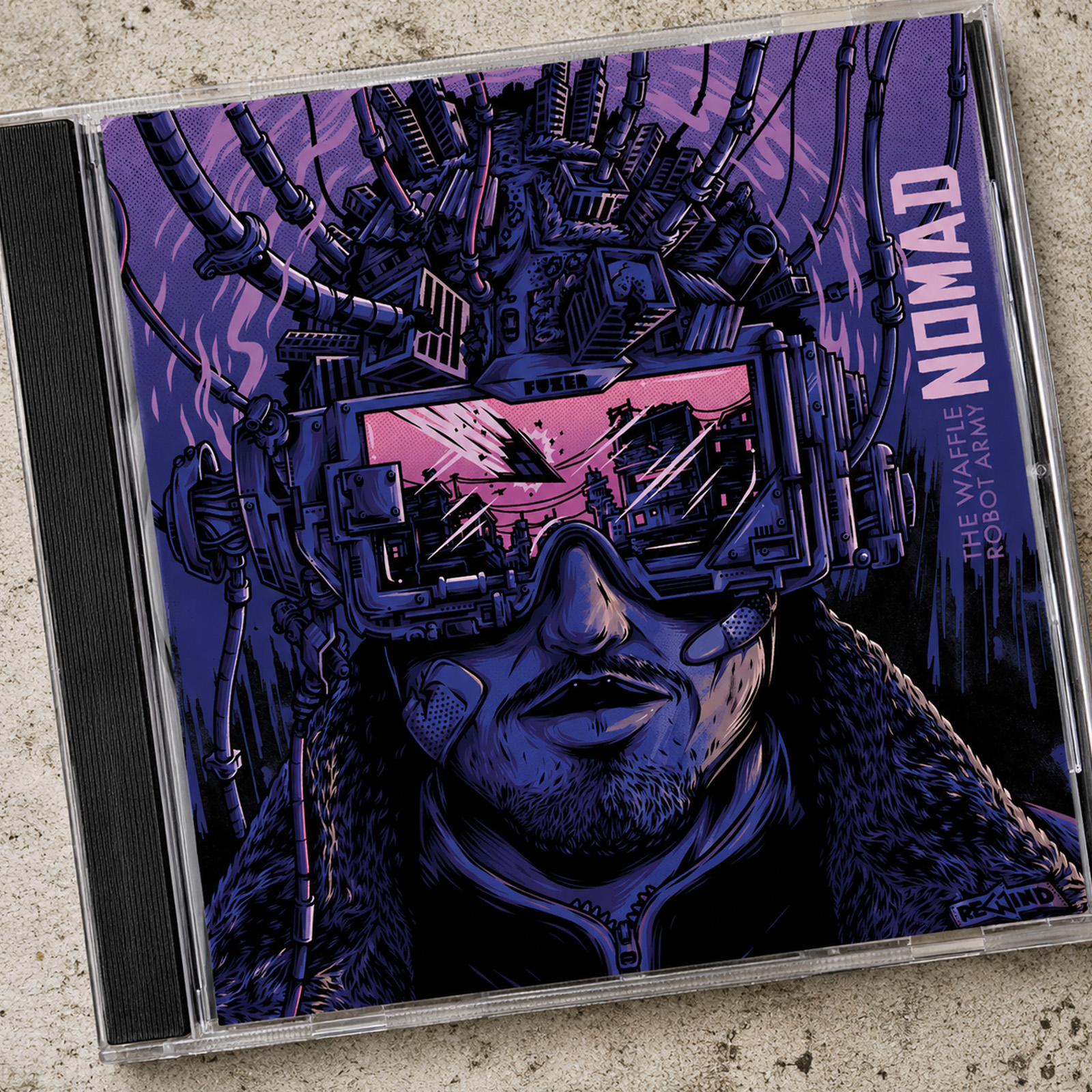 Nomad CD cover for The Waffle Robot Army featuring a man wearing a futuristic visor built from screens, cables and cyberpunk city architecture.