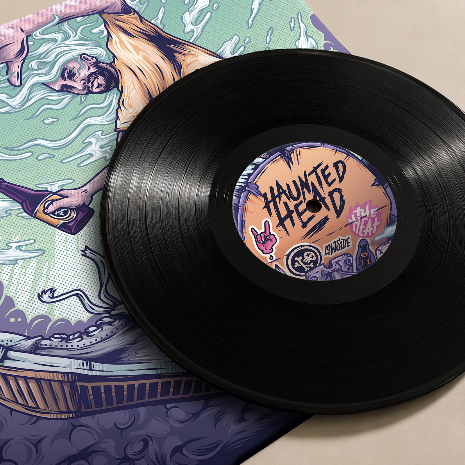Close-up detail of the vinyl above the Haunted Head artwork.