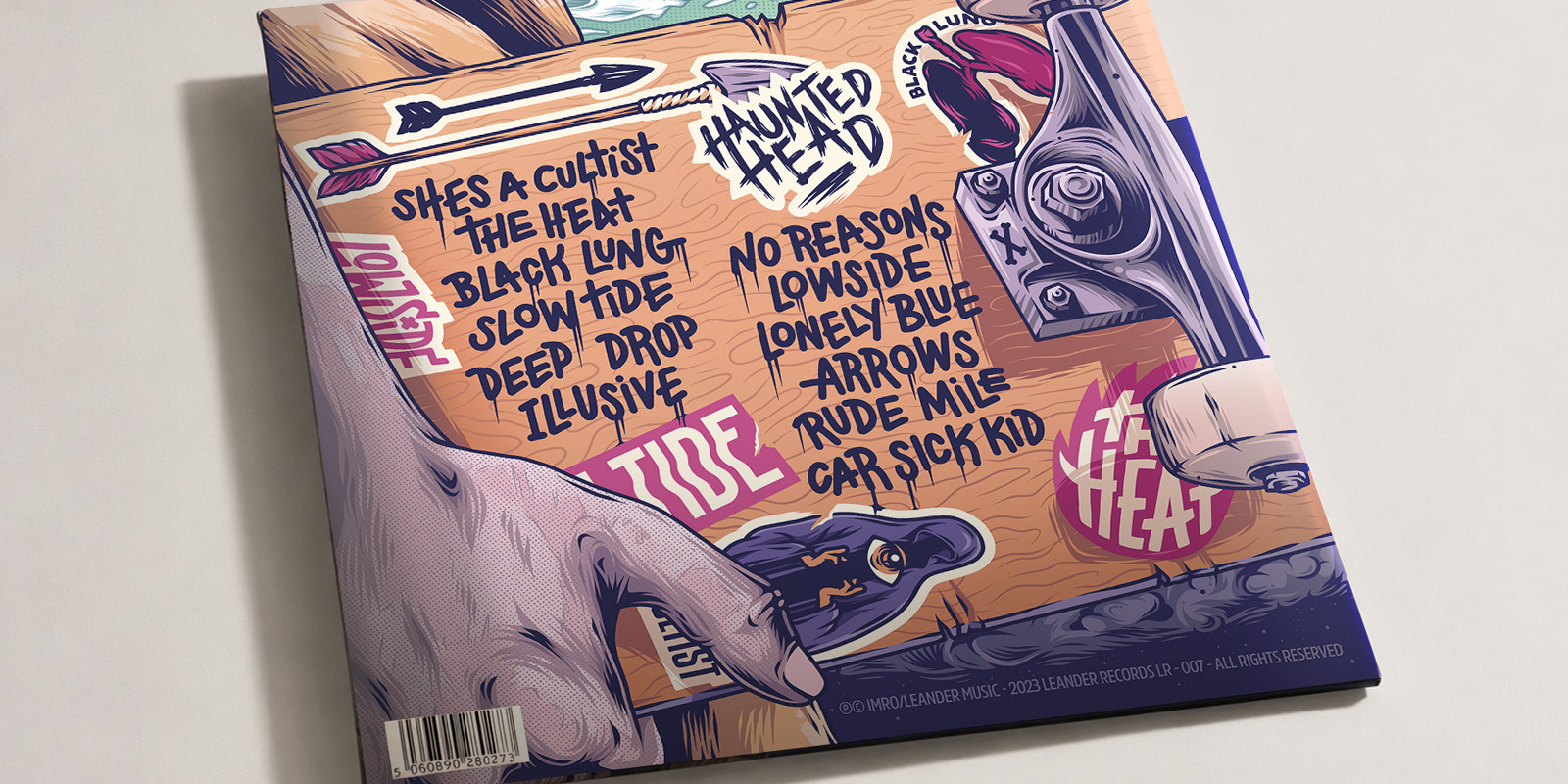 Haunted Head vinyl packaging mockup showing the front sleeve, back sleeve and black record on a purple background.