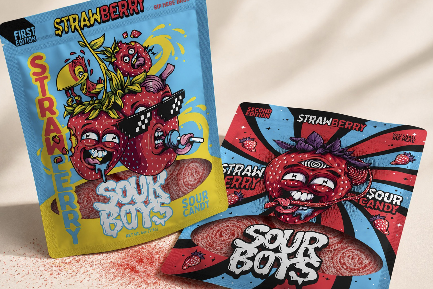 First and second edition Sour Boys Strawberry Sour Candy packaging designs displayed together with illustrated confectionery branding.