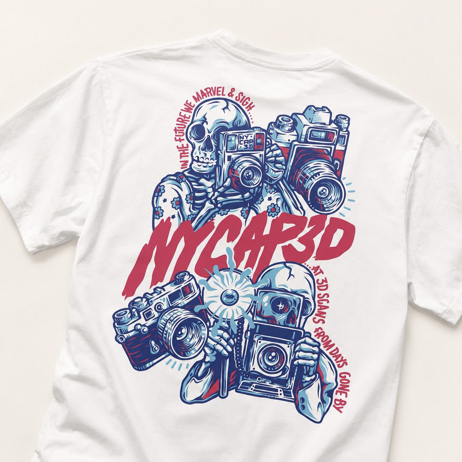 White NYCAP3D T-shirt featuring illustrated skeleton photographers, vintage cameras and bold custom typography on the back.