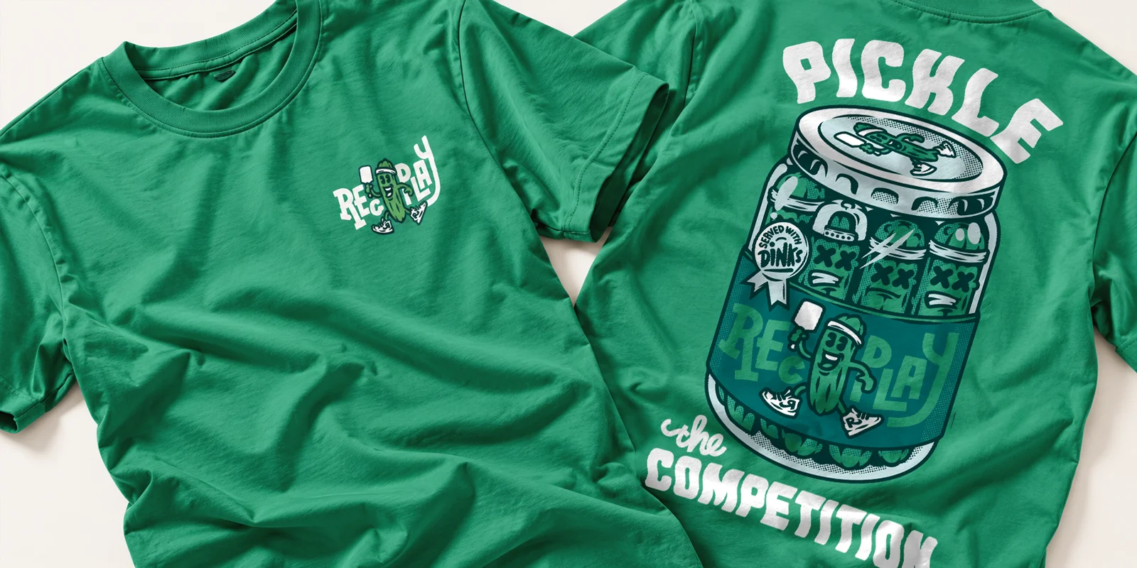 Front and back views of a green RecPLAY Pickle the Competition T-shirt featuring an illustrated pickle jar design.