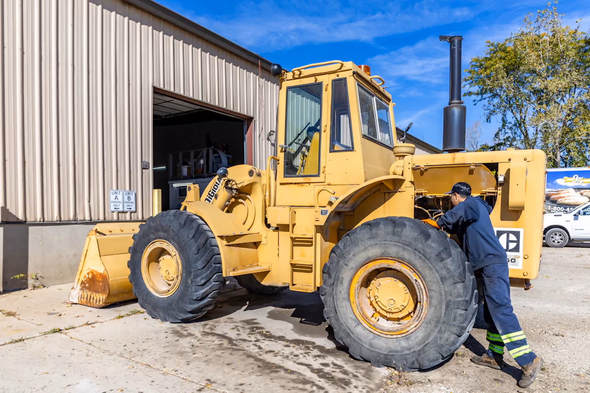 Heavy-duty mechanic performing heavy equipment repairs in Richmond, IN