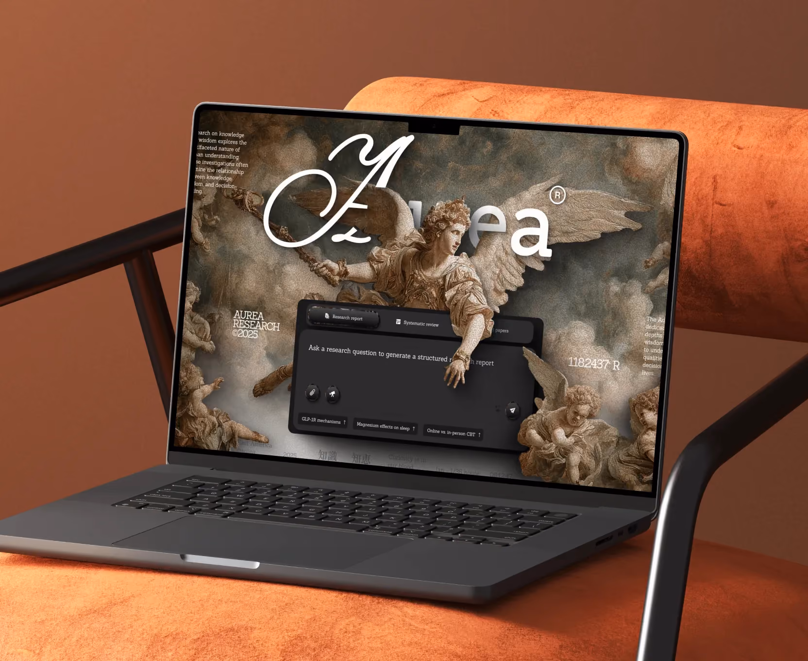Laptop on orange chair showing Aurea Research interface with angelic statue artwork and research query box.