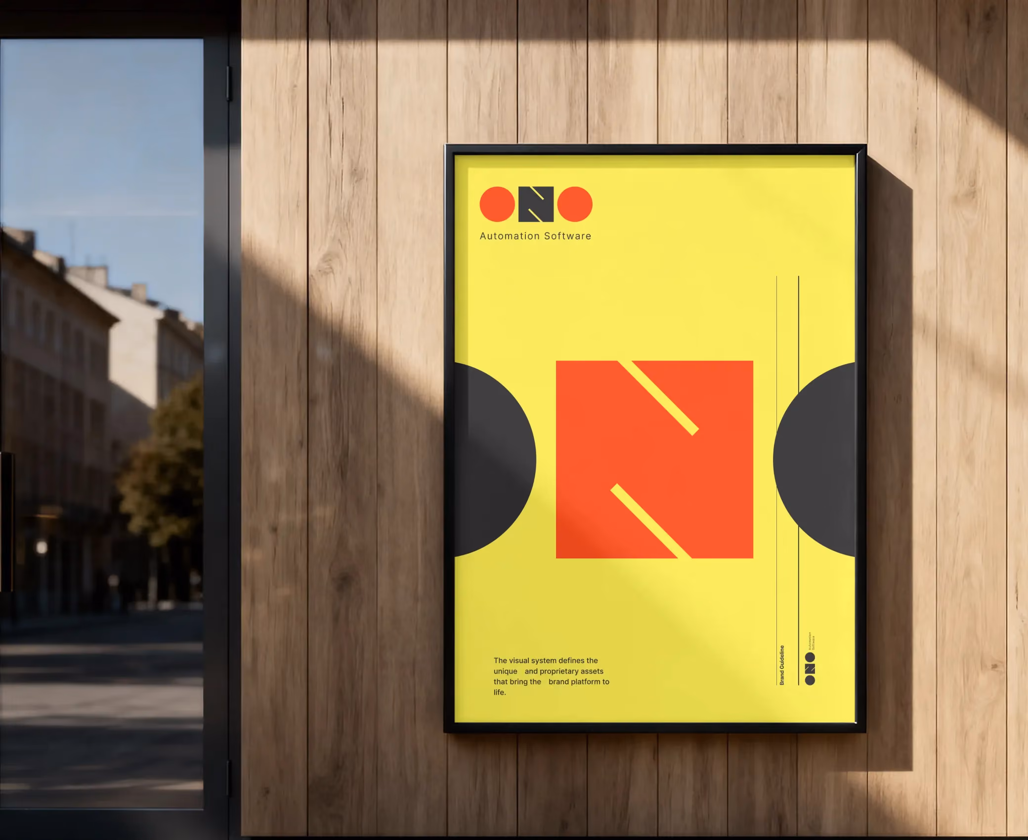Yellow poster with red and black geometric shapes and text 'Automation Software' on a wooden wall.