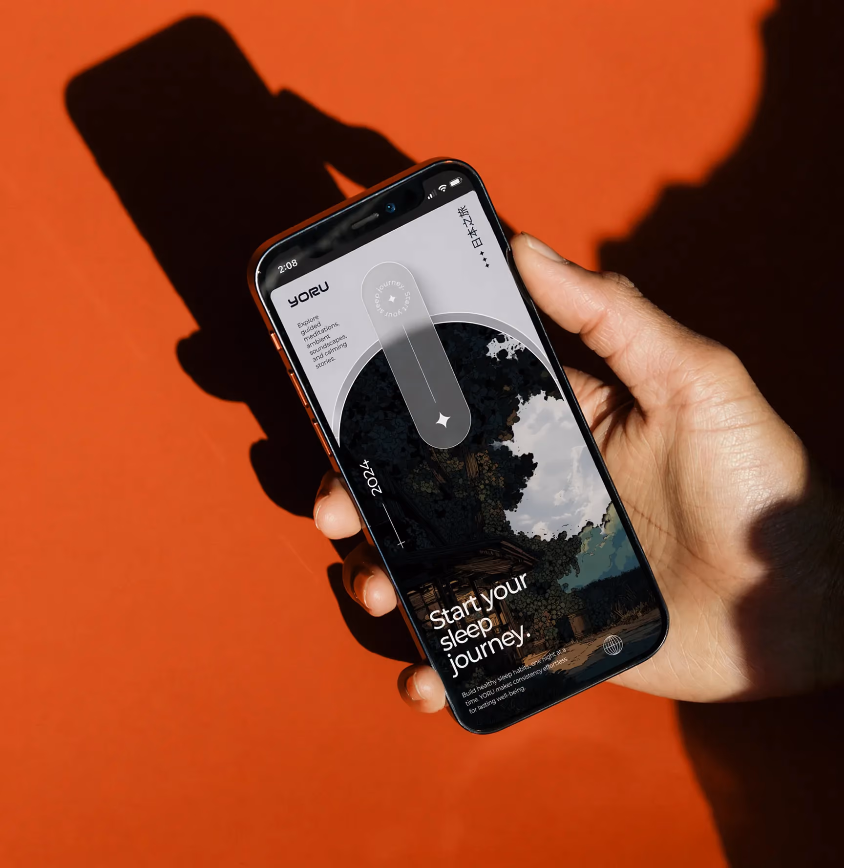 Hand holding a smartphone with a sleep journey app on a red background.