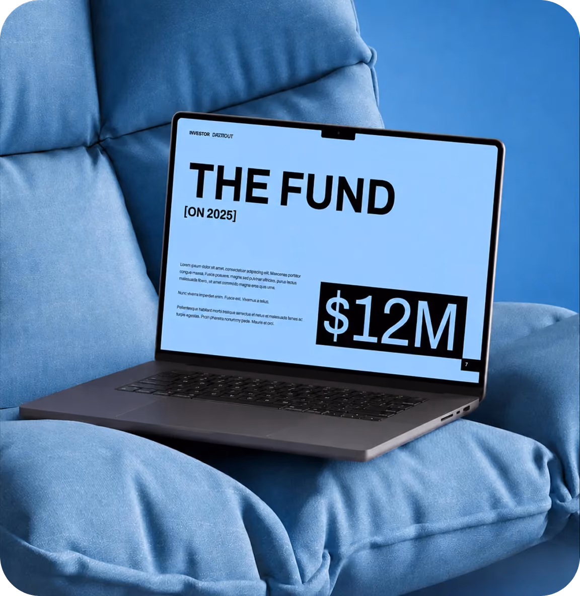 Open laptop on blue cushioned chair showing a presentation slide titled 'THE FUND' with $12M amount.