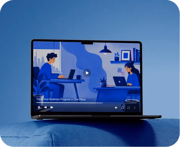 Laptop showing animated video of two people working on laptops in a blue-toned office space.