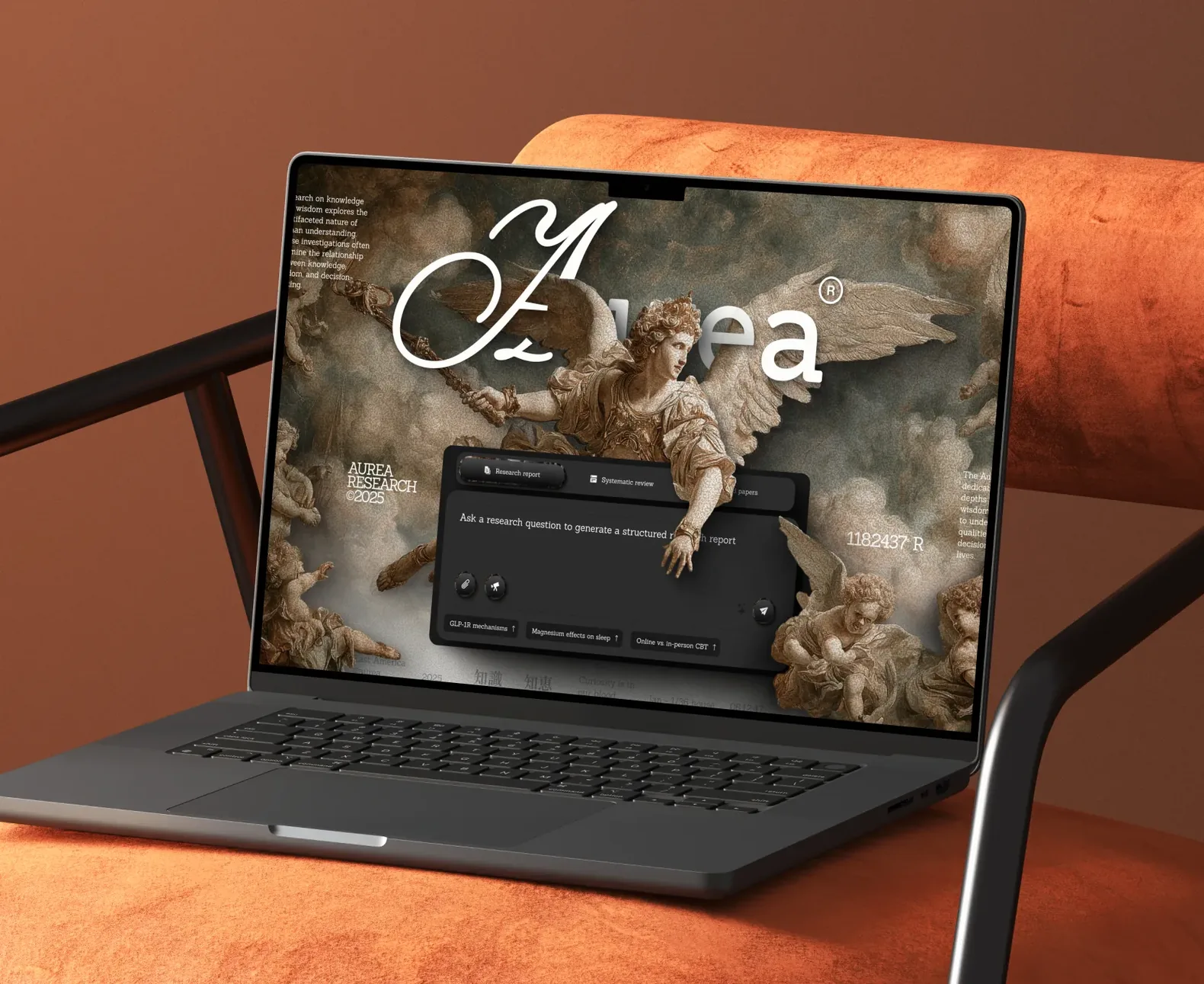 Laptop on orange chair showing Aurea Research interface with angelic statue artwork and research query box.