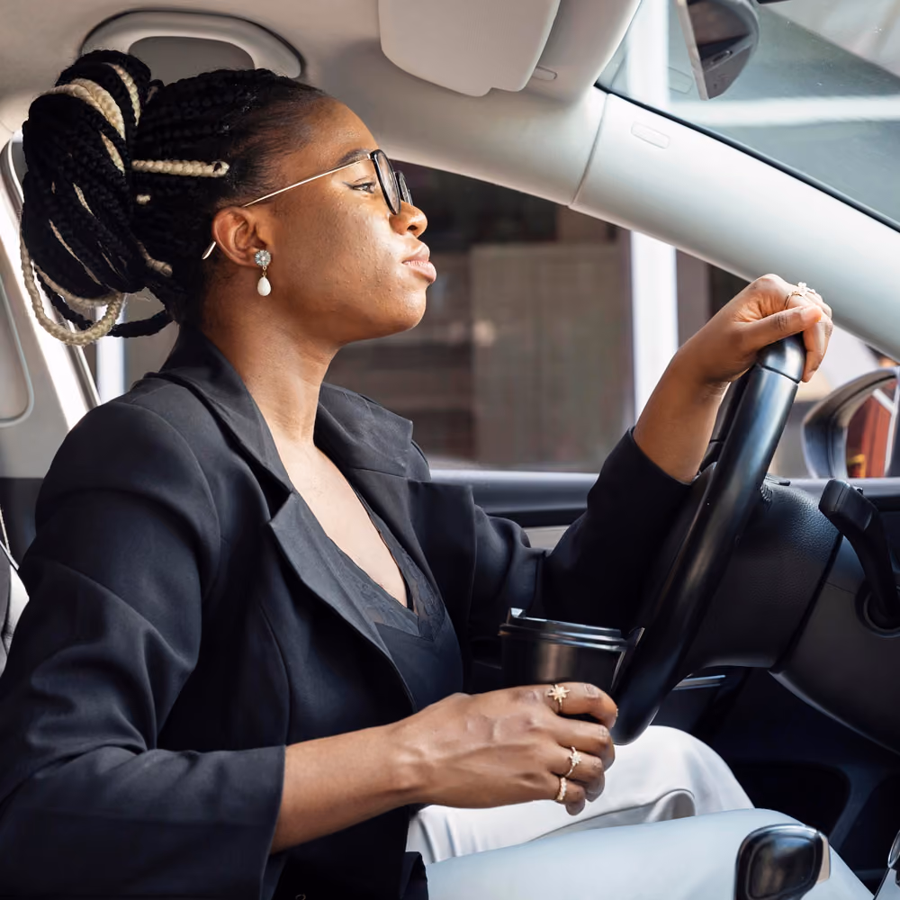 Black woman driving to work from Allen to Dallas TX