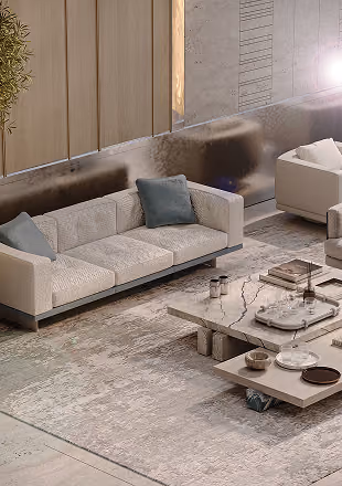 Modern living room with beige sofas, marble coffee table, and abstract wall art.