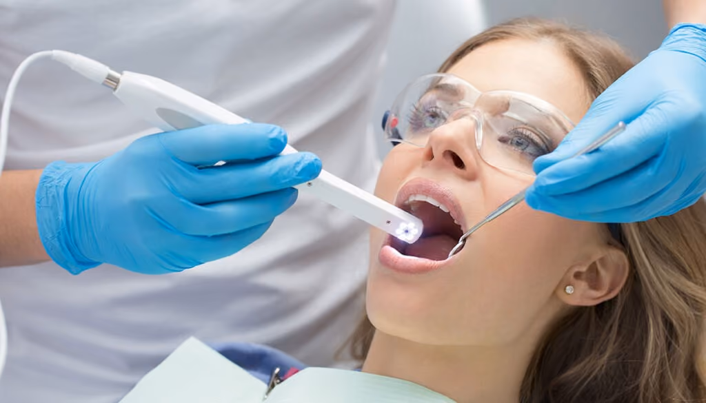 Intraoral camera showing patients what the dentist sees at Dentiq Dentistry Houston