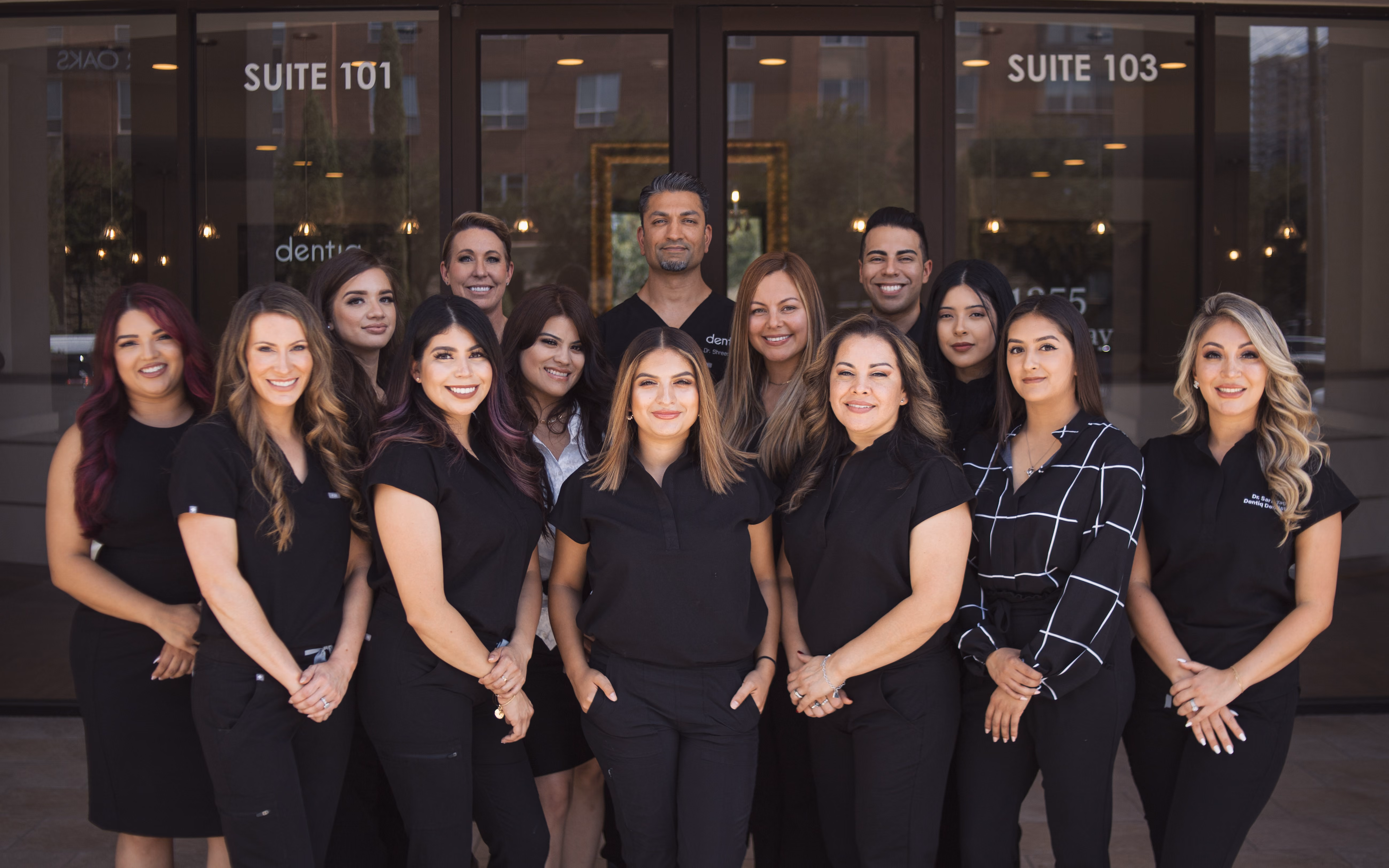 The Dentiq Dentistry Houston team, who provide fluoride treatments for kids and adults