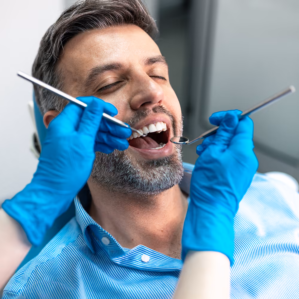Implant-supported dentures patient at Dentiq Dentistry Houston