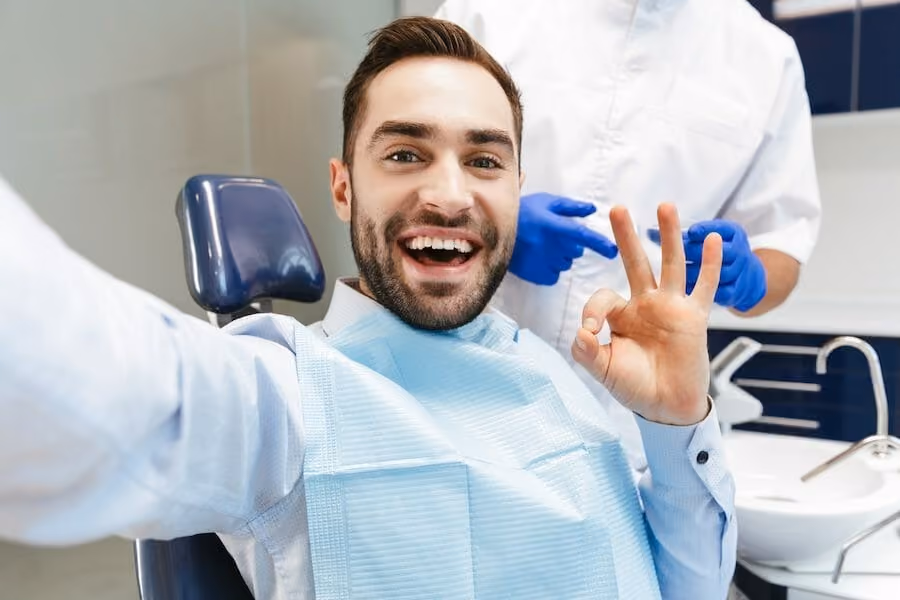 Patient comfortable during a gentle tooth extraction at Dentiq Dentistry in Houston, TX