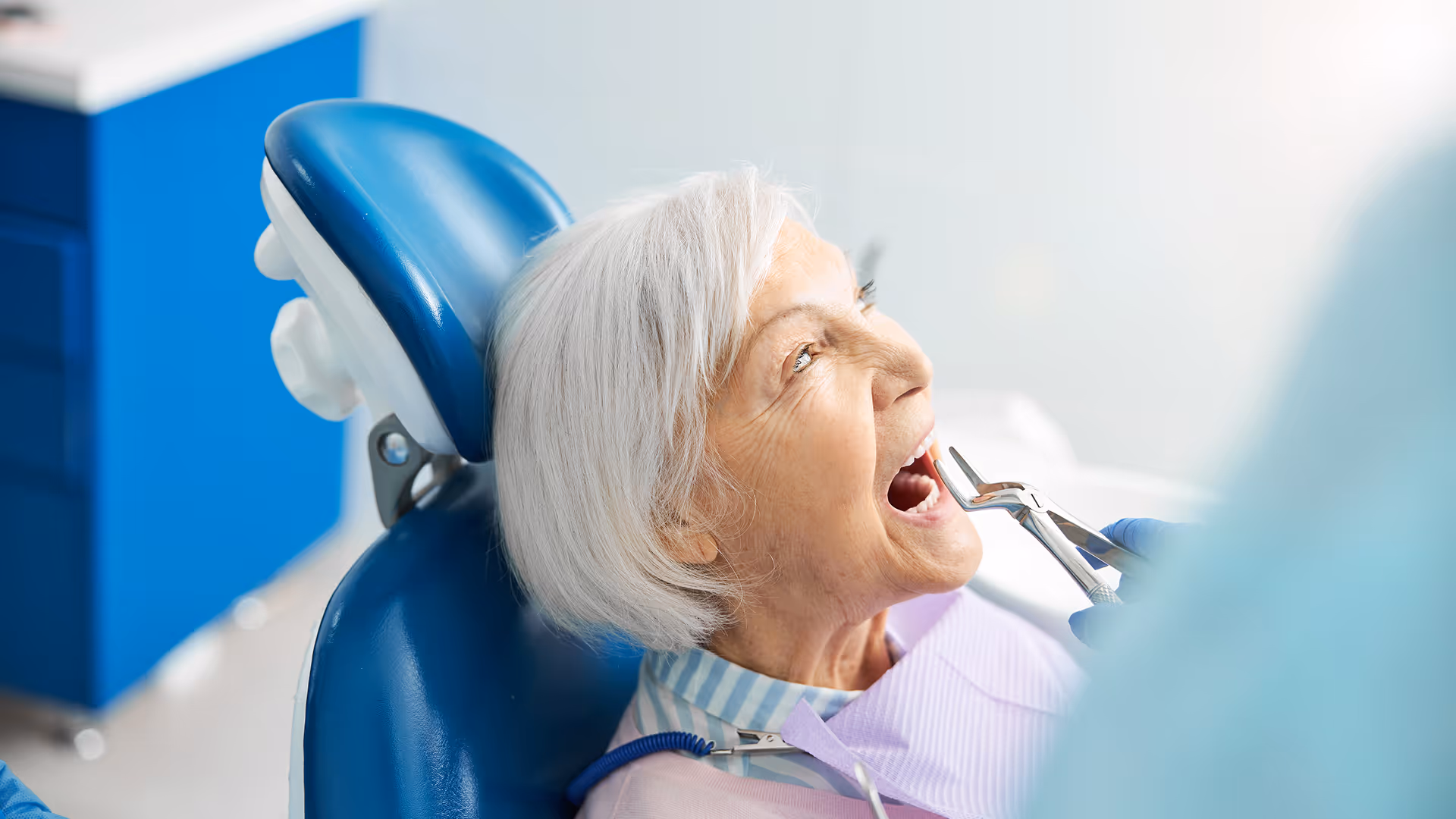 Patient consulting about a tooth extraction at Dentiq Dentistry in Houston, TX