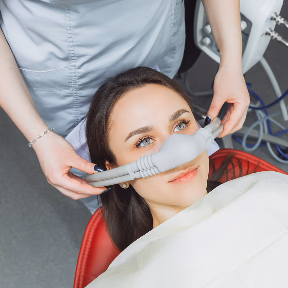 Nitrous oxide nose mask used for mild sedation during dental treatment
