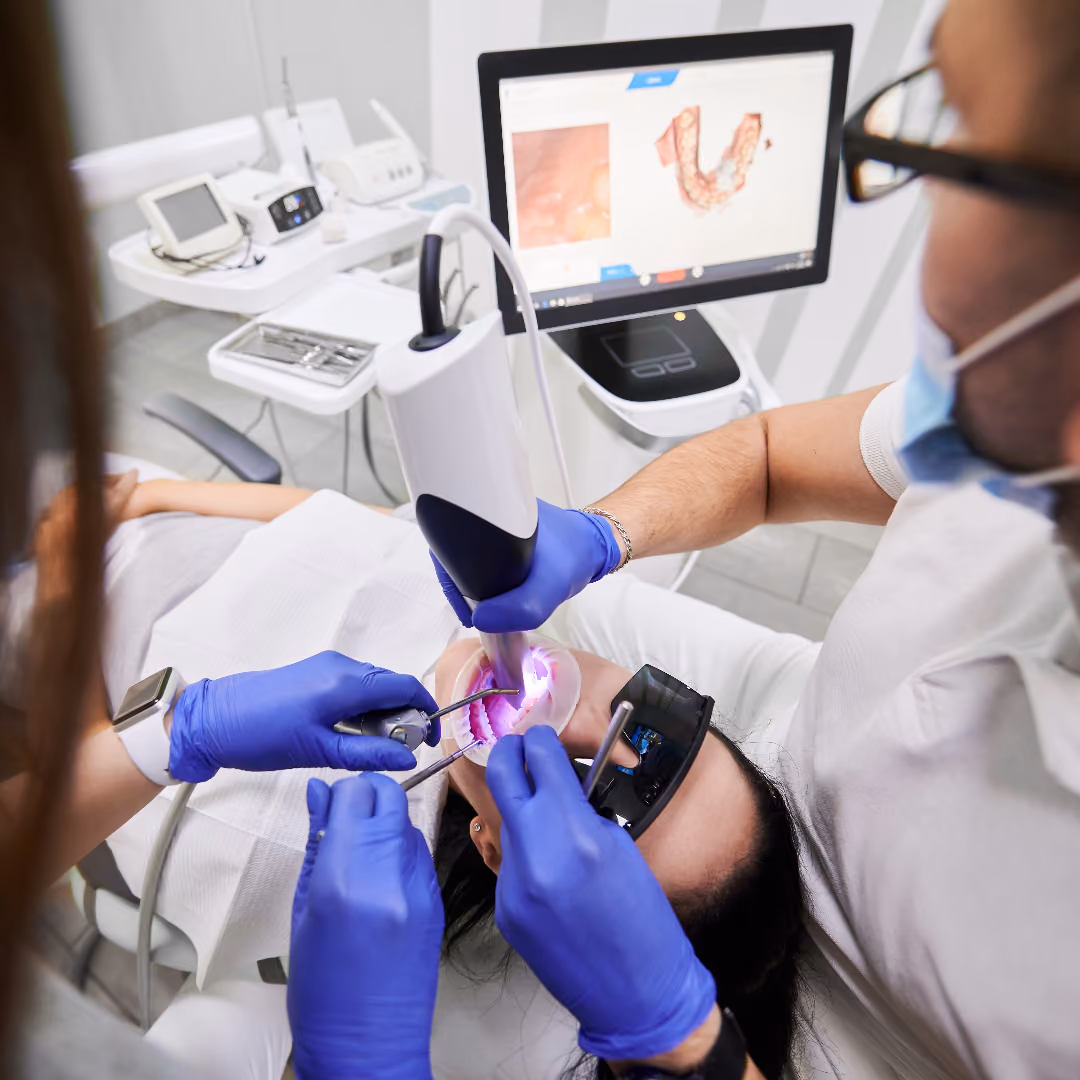 Patient having digital impressions taken with an intraoral scanner in Houston, TX