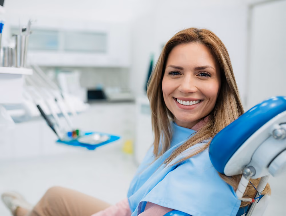 Dentiq Dentistry insurance coordinator helping a patient understand Humana dental benefits in Houston, TX
